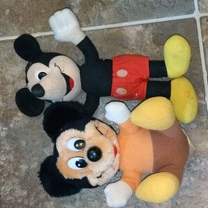 2 vintage Mickey Mouse. One states Korea.